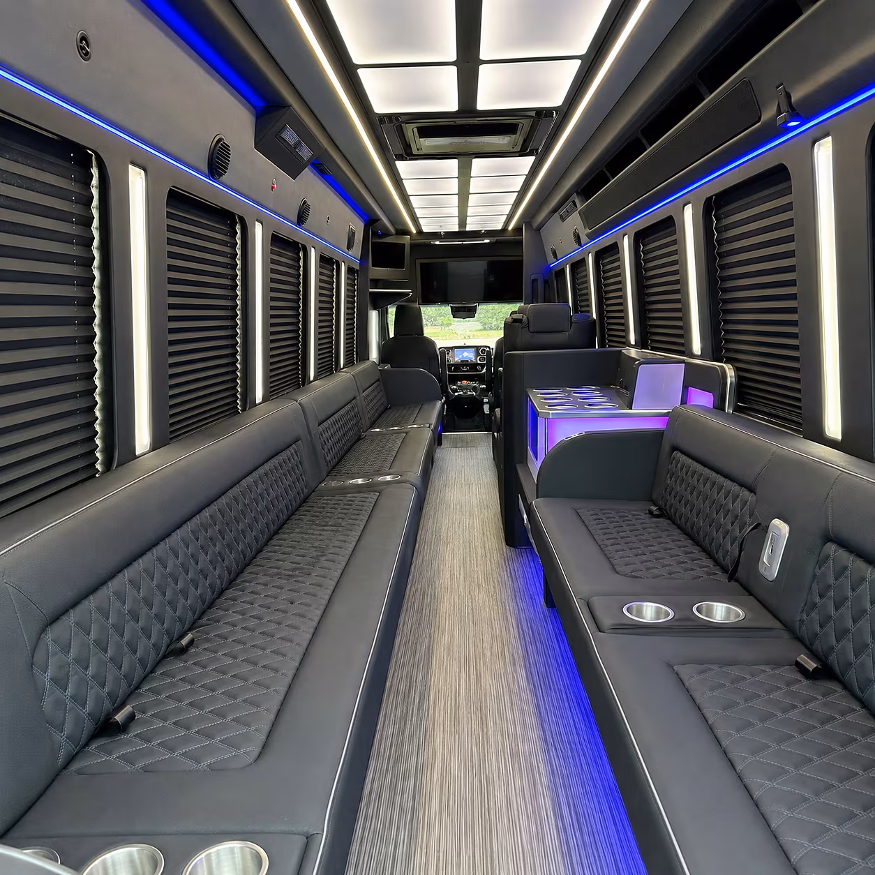 Wedding guests seated inside a party bus serving Arlington